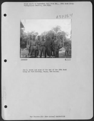 Thumbnail for Consolidated > Joe E. Brown and some of the men of the 38th Bomb Group at Port Moresby, Papua, New Guinea.