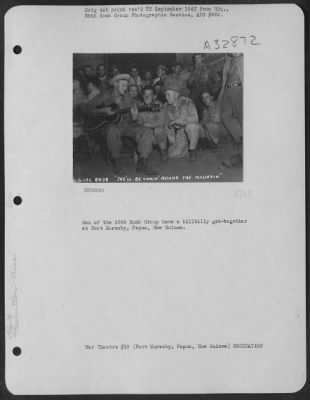 Thumbnail for Consolidated > Men of the 38th Bomb Group have a hillbilly get-together at Port Moresby, Papua, New Guinea.