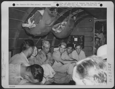 Thumbnail for Consolidated > Gary Cooper and party aboard a Douglas C-47 enroute to Port Moresby, Papua, New Guinea from Milne Bay, New Guinea, during their tour of the Pacific Islands. 7 December 1943.