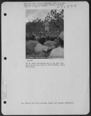 Thumbnail for Consolidated > Joe E. Brown entertains men of the 38th Bomb Group during his visit to Port Moresby, Papua, New Guinea.