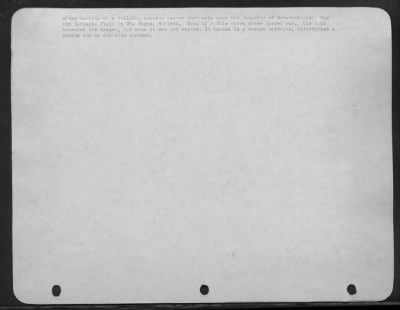 Consolidated > After bombing of a building housing secret documents near the junction of Scheveningsche Weg and Carnegie Plain in The Hague, Holland. Heap of rubble shows where target was. One bomb overshot the target, but even it was not wasted. It landed in a