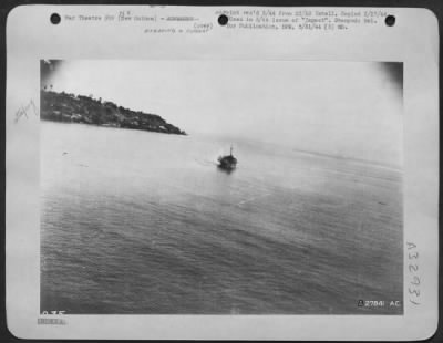 Thumbnail for Consolidated > Hit by strafing, vessel catches fire, begins to smoke. Wewak-Boram Area, New Guinea.