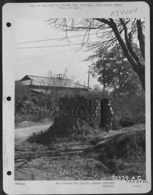 Thumbnail for Consolidated > An American officer of the Mars Task Force inspects a Jap pill-box used in guarding the inter-section in the road at Lashio, Burma. 11 March 1945.