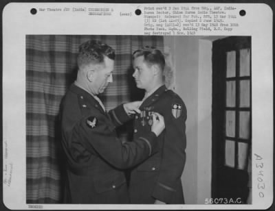 Thumbnail for Consolidated > General Earl S. Hoag awards Distinguished Flying Cross and Air Medal to Lt. r.V. Bitnen, S/Pilot, India.