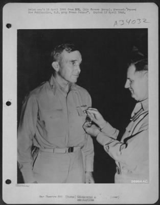 Consolidated > Maj. Gen. Howard C. Davidson, CG 10th AF left, receiving the Air Medal from Maj. Gen. George E. Stratemeyer, Air Commander, Eastern Air Command, at a ceremony performed at the 10th AF's headquarters deep in Burma. The citation reads in part: "For