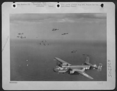 Thumbnail for Consolidated > North American B-25 Mitchells of the 12th Air Force fly over the Tyrrhenian Sea on their way to attack a strategic hun target in northern Italy on 3 January 1945. Medium bombers of the 12th Air Force, working with the 5th Army, help drive the enemy