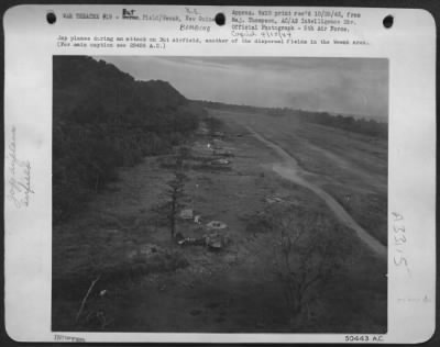 Consolidated > Jap planes during an attack on But airfield, another of the dispersal fields in the Wewak area.