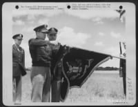 The Presidential Unit Citation is pinned on the unit flag of the 17th Bomb Group during a ceremony at an airfield somewhere in the Mediterranean Area. - Page 1