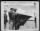 Thumbnail for The Presidential Unit Citation is pinned on the unit flag of the 17th Bomb Group during a ceremony at an airfield somewhere in the Mediterranean Area. - Page 1