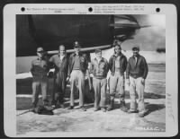 Thumbnail for The crew of the Martin B-26 "Ole Seven 5 Seven" of the 34th Bomb Squadron, 17 Bomb Group pose beside their plane at an airfield somewhere in the Mediterranean Area. - Page 1