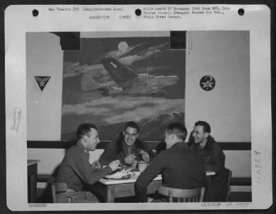 Thumbnail for Consolidated > Officers Of The 414Th Night Fighter Squadron At Chow.  Note The Murals On The Wall.  L. To R.  Capt. J.C. Jenkins, Wyoming, Del., Pilot; Capt. John L. Feldman, One University Pl., N.Y. City, Medical Officers; 2Nd Lt. Richard G. Rumsey, Boston, Mass., Pilo