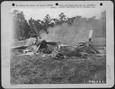 Thumbnail for Consolidated > Burning Lockheed P-38 of the 9th Fighter Squadron which was hit by Japanese bombers on Air Strip #4, Dobodura, (Horando) near Port Moresby, Papua, New Guinea, 41 Division Headquarters. 11 March 1943.