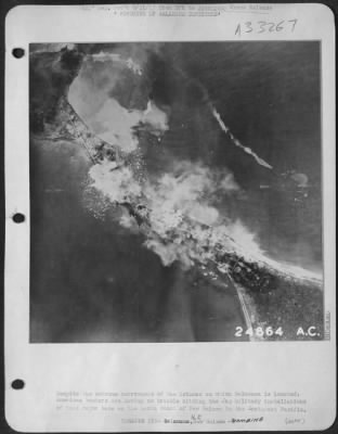 Thumbnail for Consolidated > Great clouds of smoke seen here are rising form the destruction caused by the accurate bombing of the Fifth Air Force.