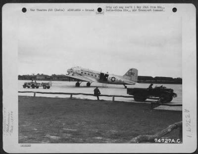 Thumbnail for Consolidated > Douglas C-47 "Assam Air Lines" Of The 1337Th Aaf Base Unit, Air Transport Command, On Runway At Assam, India.  10 May 1945.