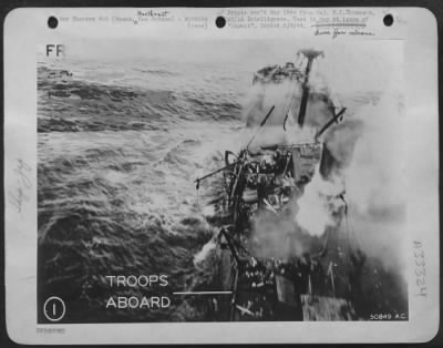 Thumbnail for Consolidated > Floundering from a previous low-level attack, is this 4000 ton Jap troopship, No 2 prize of March 19, 1944 destruction of Wewak convoy.