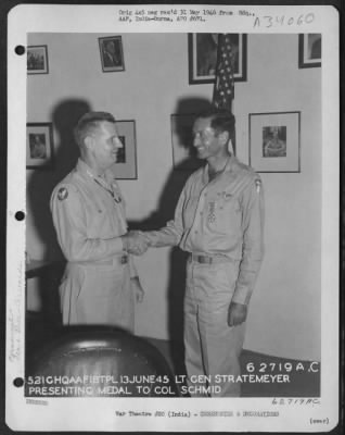 Thumbnail for Consolidated > Lt. General George E. Stratemeyer Congratulates Colonel Schmid After Presenting Him With The Legion Of Merit At An Airbase In India On 13 June 1945.