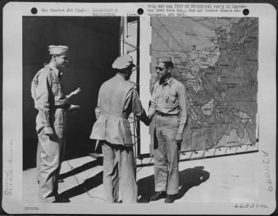 Thumbnail for Consolidated > Colonel William H. Blanchard And General Roger M. Ramey Presenting The Silver Star To Major Donald W. Roberts, Los Angeles, California.  20Th Bomber Command, India.