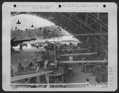 Thumbnail for Consolidated > General View Of The 27Th Air Depot Group Sheet Metal Shop, Showing The Men At Work.  The Shop Was Located In Hangar #1 At The Port Moresby Air Depot, Papua, New Guinea.  21 October 1943.