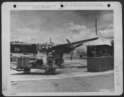 Thumbnail for Consolidated > Men Use Steam To Clean A Lockheed P-38 "Lightning" At The Washing Department Of The 27Th Air Depot Group, Port Moresby Port Depot, Papua, New Guinea.