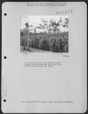 Thumbnail for Consolidated > Joe E. Brown And Men Of The 38Th Bomb Group Singing 'God Bless America' During His Visit At Port Moresby, Papua, New Guinea.