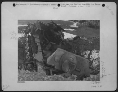 Consolidated > A Self-Propelled [Jagdpanzer Iv Anti-Tank] Gun On A Mark Iv Tank Chassis Lies Smashed In A Bomb Crater Near Marnach, 3 Miles West Of Dasburg, Destroyed By Fighter-Bombers Of The Xix Tac During Mass German Withdrawal Across The Our River Jan 22-25, 1945.