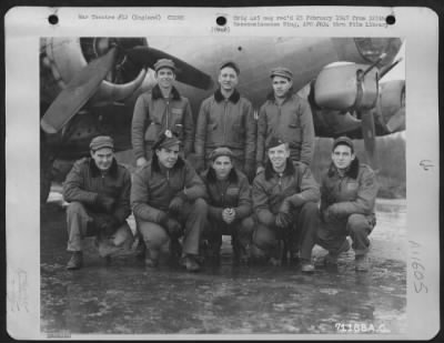 General > Lt. Albert And Crew Of The Boeing B-17 "Flying Fortress" Of The 390Th Bomb Group Pose By Their Plane At Their Base In England On 13 January 1945.