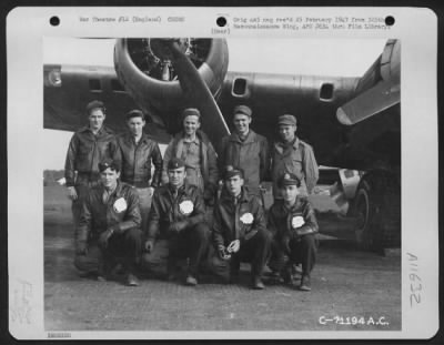 General > Lt. Hedrick And Crew Of The Boeing B-17 "Flying Fortress" Of The 390Th Bomb Group Pose By Their Plane At Their Base In England On 12 November 1944.