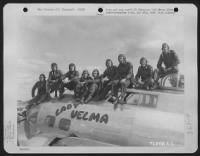 Thumbnail for Lt. Evan And Crew Of The Boeing B-17 'Lady Velma' Of The 390Th Bomb Group Pose On Top Of Plane At Their Base In England On 1 October 1944. - Page 1