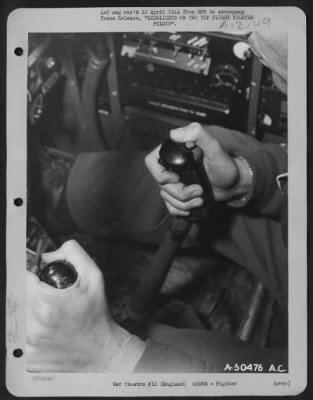 Fighter > ENGLAND-Shown here is the trigger-finger technique of Capt. Don S. Gentile, USAF fighter ace, when firing on Nazi aircraft.
