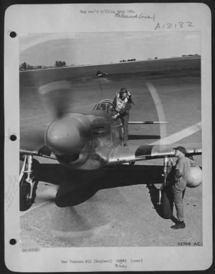 Fighter > ENGLAND-Lt. William Groseclose of Pierre, S.D., pilot, is shown standing on the wing of his Mustang fighter plane, ready to get into the cockpit. Crew chief, S/Sgt. Harry E. East of Omaha, Nebraska, stands by.