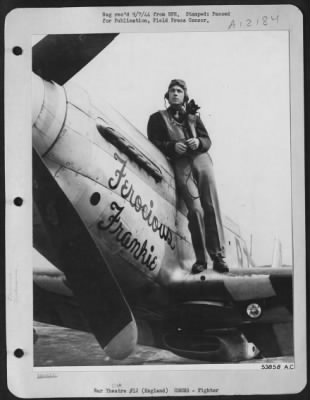 Thumbnail for Fighter > ENGLAND-Lt. Col. Wallace E. Hopkins of Washington, Ga., poses on the wing of his North American P-51 Mustang fighter "FEROCIOUS FRANKIE" named for his wife, Mrs. Frankie L. Hopkins. The 25 year old 8th AF Fighter Command Pilot and acting