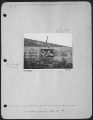 Ground > Ground crew of Boeing B-17 Flying ofrtress "Hell's Angels" in waist window.