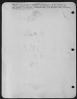 ENGLAND-T/Sgt Charles E. Edwards, 24, Cordele, Ga., flight engineer on "Flying Crusader" checks perofrmance of plane ofllowing mission with M/Sgt John Coltran. The two have a conference every time the plane lands, and usually Edwards gives good - Page 2