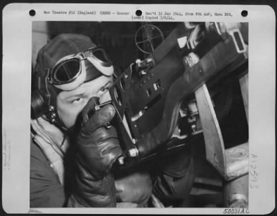 Thumbnail for Gunner > One of the gunners alerted back down the body of the ofrtress is waist-gunner, Don King, of Imperial, Texas. In combat, the gunners "pass the Jerry" back from position to position, warning each successive position from nose to tail: "Here he comes