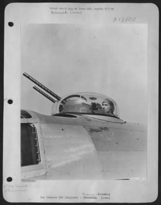 Thumbnail for Gunner > ENGLAND-S/Sgt. Walter R. Newbury, top turret gunner on a B-24, of Batavia, N.Y., has 30 missions to his credit and holds the Distinguished Flying Cross and the Air Medal with 3 Oak Leaf Clusters. (Kodachrome #2395)