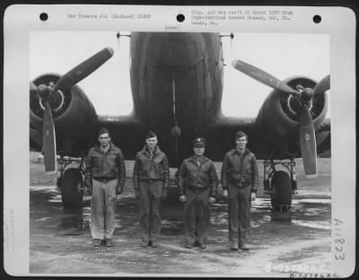 General > A Douglas C-47 Crew Of The 439Nd Troop Carrier Pose In Front Of Their Plane At An Airbase Somewhere In England.  9 July 1944.