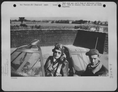 Thumbnail for General > Lt. Winslow Michael Sobanski, Republic P-47 Pilot, Is Shwon With His Crew Chief At An Airbase Somewhere In England Just Before Take Off On A Mission Against The Enemy.