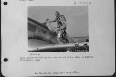 Thumbnail for Fighter > Capt. Eisenhart Climbing Into The Cockpit Of His Plane In England.  10 September 1944.