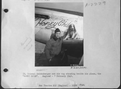 Thumbnail for Fighter > Lt. Colonel Goldenburger And His Dog Standing Beside His Plane, The 'Honey Chile'.  England.  7 February 1945.