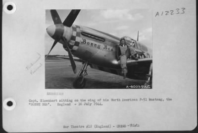 Thumbnail for Fighter > Capt. Eisenhart Sitting On The Wing Of His North American P-51 Mustang, The 'Bonny Bea'.  England - 16 July 1944.