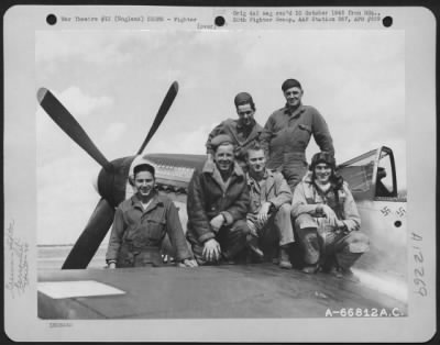 Thumbnail for Fighter > Lt. Campbell, Pilot, And Ground Crew Beside A North American P-51 Mustang Of The 20Th Fighter Group At An Airbase In England.