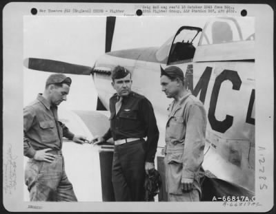 Thumbnail for Fighter > Lt. Colonel Johnson (??) Talks Things Over With The Ground Crew Of His North American P-51 Mustang Of The 20Th Fighter Group In England.