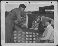 Lt. Colonel Francis S. Gabreski Chats With His Loyal Ground Men Who Keep His Republic P-47 Thunderbolt Mechanically Perfect.  They Are, Left To Right: Crew Chief S/Sgt. Ralph H. Safford Of Ionia, Michigan; Colonel Gabreski; And Cpl. Felix Schacki Of Gary, - Page 1