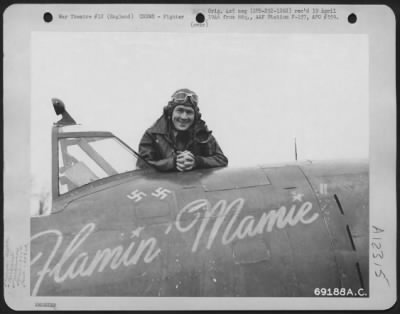 Thumbnail for Fighter > Lt. W.W. Odum, Pilot Of The 350Th Fighter Squadron, 353Rd Fighter Group, Poses For The Photographer Shortly Before He Climbs Into The Cockpit Of His Republic P-47 "Flamin' Mamie" At An Airbase In England.