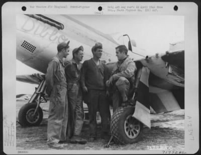 Thumbnail for Fighter > Lt. L.V. Andrews And Sgt. L.J. Gold Of The 364Th Fighter Group, Pose In Front Of Their North American P-51 'Passionate Pat' At An 8Th Air Force Base In England.  Sgt. Gold Proudly Holds Their Dog Mascot.  9 February 1945.