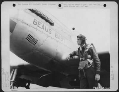 Thumbnail for Fighter > Lt. Beaumont, Pilot Of The 364Th Fighter Group, 67Th Fighter Wing, Looks Up At The Nickname Of His North American P-51 'Beau'S Baby' After Returning From A Mission, To The 8Th Air Force Station F-375, Honnington, England.  17 August 1944.