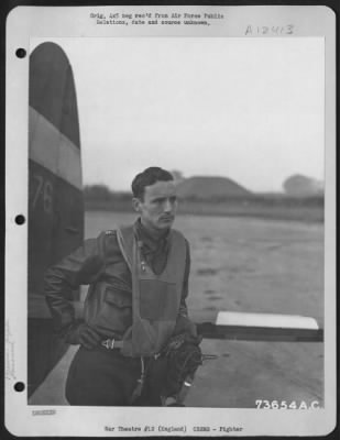 Thumbnail for Fighter > Capt. Walter C. Beckham, De Funiak Springs, Fla., Poses By The Tail Of A Republic P-47 At An Air Base Somewhere In England.