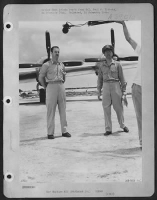 Thumbnail for Consolidated > Left:  Maj. Thomas W. Ferebee, Bombardier Of B-29 'Enola Gay' Which Atom-Bombed Hiroshima, Japan.  Right:  Maj. Monahan, Public Relations Officer From Washington, D.C.  Marianas Is.