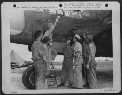 Thumbnail for Consolidated > Lt. D.F. Haberman Points Proudly To His First Jap 'Score Flag' On The Nose Of His Northrop P-61 'Black Widow' As Far As It Is Known This Is The First P-61 To Shoot Down An Enemy Plane.  Saipan, Marianas Islands, 1 July 1944.