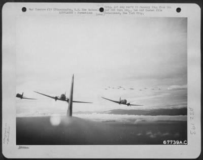 Thumbnail for Consolidated > Douglas C-47's enroute to Finschhafen, N.E. New Guinea, carrying supplies for a fighter group. 18 December 1943.